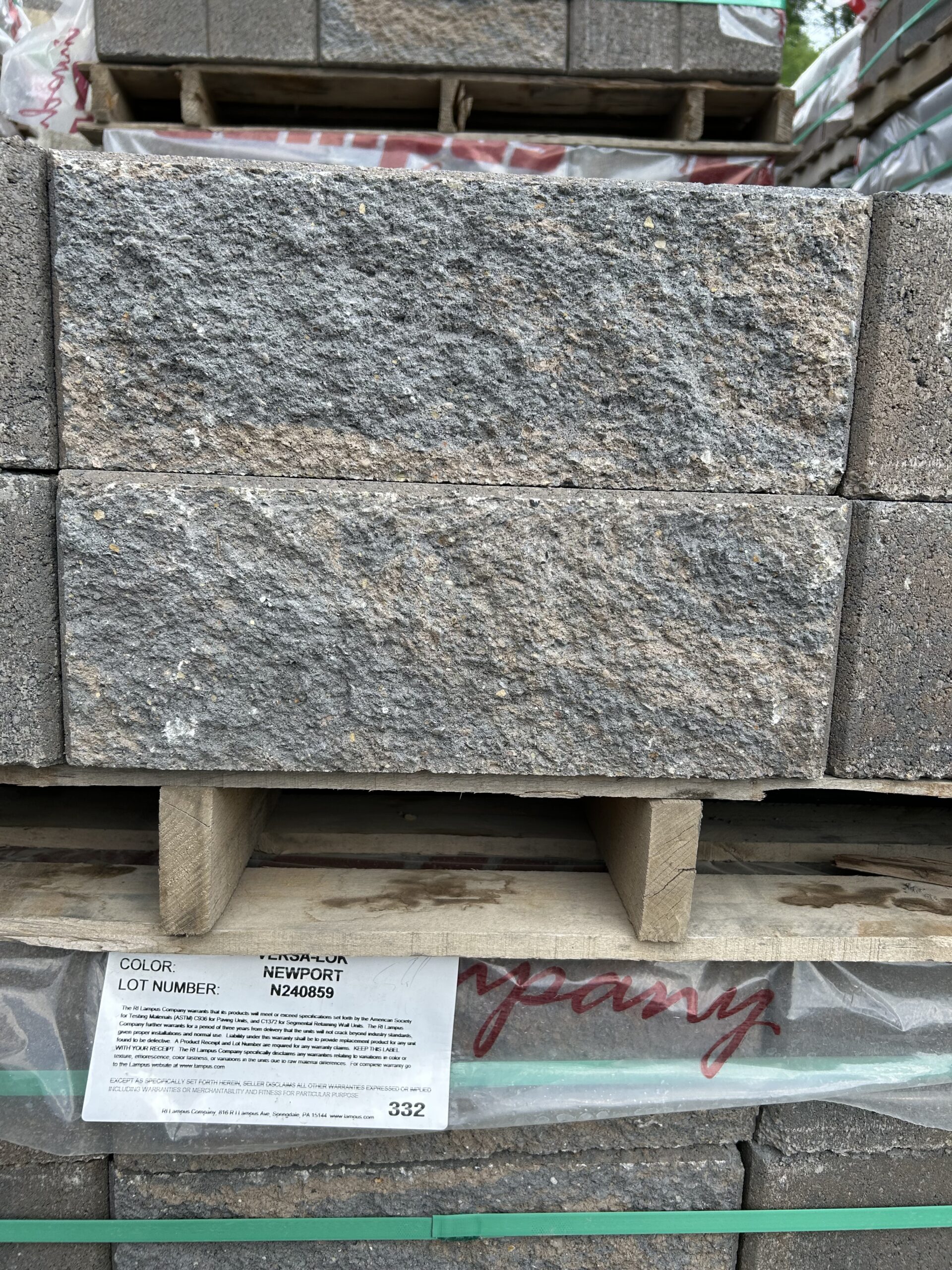 Light grey and tan stone rectangular block
